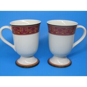 Raymond Waites Certified International  Ancient Kingdom Set Of 2 Footed Mugs